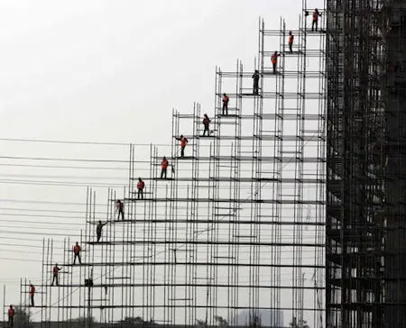Indian labourers busy in construction of a new mall in Gurgaon, south of New Delhi, India, January 31, 2008.  Indian buyers now have variety to choose from with the opening of new Malls, where its growing consumerism meets growing prosperity.  (UPI Photo)