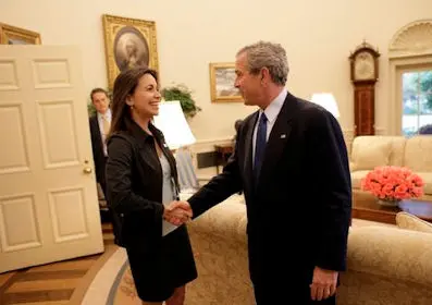 1310 President Bush: Meeting with the Executive Director of the Venezuelan Civil Society Group Sumate. Oval Office. resident George W. Bush met on May 31, 2005 with Maria Corina Machado, the Founder and Executive Director of Sumate.  Sumate is an independent democratic civil society group in Venezuela.  White House photo by Eric Draper