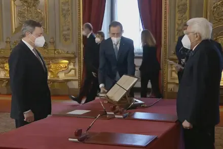 Prime Minister designate Mario Draghi with President Sergio Mattarella during the swearing-in ceremony at the Presidential Palace in Rome, Italy, February 13, 2021 in this still image taken from video. RAI POOL/REUTERS TV via REUTERS  NO RESALES. NO ARCHIVES. THIS IMAGE HAS BEEN SUPPLIED BY A THIRD PARTY.