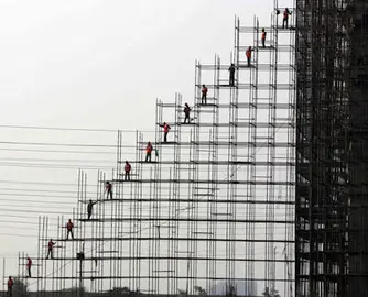 Indian labourers busy in construction of a new mall in Gurgaon, south of New Delhi, India, January 31, 2008.  Indian buyers now have variety to choose from with the opening of new Malls, where its growing consumerism meets growing prosperity.  (UPI Photo)