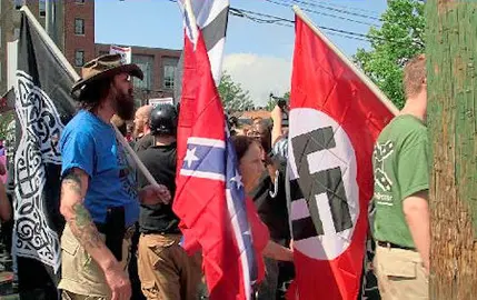 August 12, 2017 - Charlottesville, Virginia, United States - Demonstrators carry confederate and Nazi flags during the Unite the Right free speech rally at Emancipation Park in Charlottesville, Virginia, USA on August 12, 2017. Charlottesville United States PUBLICATIONxINxGERxSUIxAUTxONLY - ZUMAn230 20170812_zaa_n230_342 Copyright: xEmilyxMollix



August 12 2017 Charlottesville, Virginia Virginia United States demonstrator Carry Confederate and Nazi Flags during The Unite The Right Free Speech Rally AT Emancipation Park in Charlottesville, Virginia Virginia USA ON August 12 2017 Charlottesville, Virginia United States PUBLICATIONxINxGERxSUIxAUTxONLY  20170812_zaa_n230_342 Copyright xEmilyxMollix