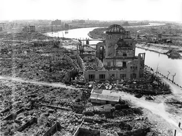 TO GO WITH AFP STORY "JAPAN-US-NUCLEAR-HISTORY-WWII-HIROSHIMA-ANNIVERSARY" BY HIROSHI HIYAMA This handout picture taken on November, 1945 by US Army and released from Hiroshima Peace Memorial Museum shows the A-bomb Domea, three months after the atomic bomb was dropped by B-29 bomber Enola Gay over the city of Hiroshima. Charred bodies bobbed in the brackish waters that flowed through Hiroshima 70 years ago this week, after a once-vibrant Japanese city was consumed by the searing heat of the world's first nuclear attack. About 140,000 people are estimated to have been killed in the attack, including those who survived the bombing itself but died soon afterward due to severe radiation exposure.  AFP PHOTO / HIROSHIMA PEACE MEMORIAL PARK---EDITORS NOTE---HANDOUT RESTRICTED TO EDITORIAL USE - MANDATORY CREDIT "AFP PHOTO / HIROSHIMA PEACE MEMORIAL MUSEUM" - NO MARKETING NO ADVERTISING CAMPAIGNS - DISTRIBUTED AS A SERVICE TO CLIENTSHIROSHIMA PEACE MEMORIAL MUSEUM/AFP/Getty Images